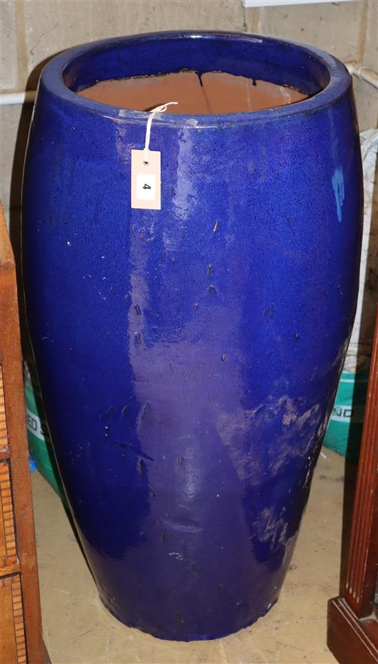 A blue glazed garden planter, 43cm diameter, H.88cm